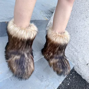 Close-up detail of ultra-fluffy faux fur snow boots in Y2K style worn on stairs