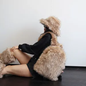 Close-up detail of a fluffy beige faux raccoon fur backpack in a trendy Y2K style.