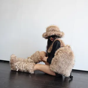 Large faux raccoon fur backpack shown with matching Y2K winter fashion furry accessories