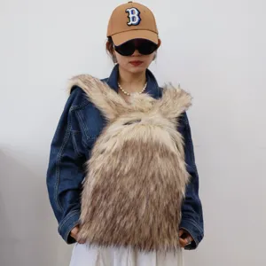 Close-up of a Y2K style large faux raccoon fur backpack on a model