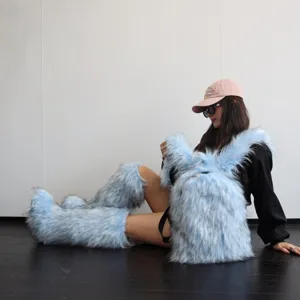 Macro view of plush light blue faux fur backpack and matching leg warmers for Y2K fashion style