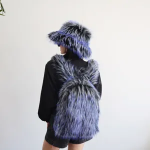 Detailed view of stylish blue and black faux fur backpack with matching hat on a model back