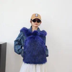 Vibrant blue faux raccoon fur backpack featuring a fluffy texture for Y2K fashion aesthetics