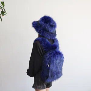 Detailed back view of a blue Y2K faux raccoon fur backpack and matching furry hat