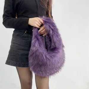 Close-up of a stylish purple faux fur handbag with soft fluffy texture and Y2K aesthetic