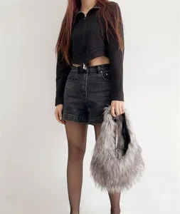 Chic gray faux fur handbag shown with trendy Y2K style outfit for stylish women