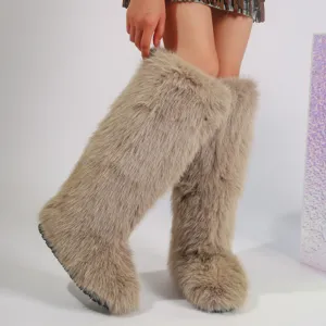 Macro detail view of warm Y2K faux fox fur knee-high snow boots worn by a fashion model