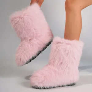 Vue détaillée des bottes de neige mi-mollet en fausse fourrure rose au style Y2K