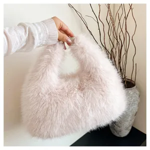 Elegant light pink faux fox fur tote bag with soft plush texture for women