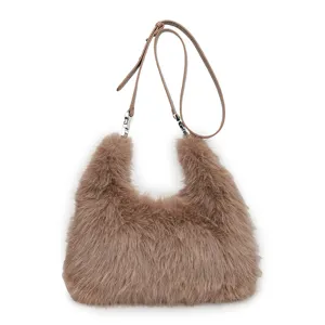 Plush faux fox fur shoulder bag with adjustable strap in warm brown for autumn and winter