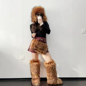 Macro detail of Y2K brown faux fur knee-high snow boots with fluffy shaggy texture