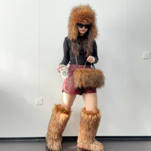 Y2K style brown faux fur high boots with matching fluffy hat and handbag for winter outfit