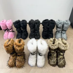 Detail view of colorful Y2K faux fur snow boots featuring punk rivet buckle straps