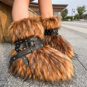Close-up detail of Y2K punk faux fur snow boots with black studded leather belts