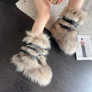 Close-up of Y2K punk faux fur snow boots with black studded leather buckles.