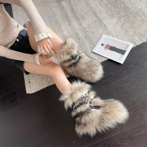 Close-up of Y2K punk style faux fur snow boots with rivet straps worn by a model