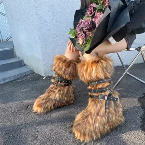 Detailed view of Y2K punk faux fur snow boots with silver studded leather straps.
