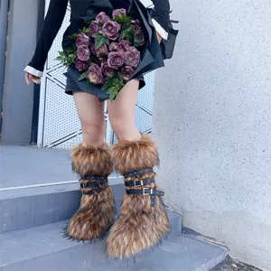 Detailed view of Y2K punk style faux fur boots featuring black buckles and studs