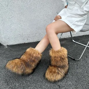 Macro view of fluffy faux raccoon fur snow boots in a stylish Y2K outdoor setting