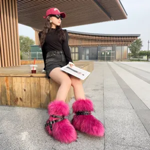 Punk style Y2K platform snow boots featuring vibrant pink faux fur and metal rivet straps.