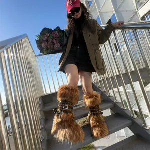 Macro view of trendy Y2K style brown faux fur platform boots with punk rivet buckle straps