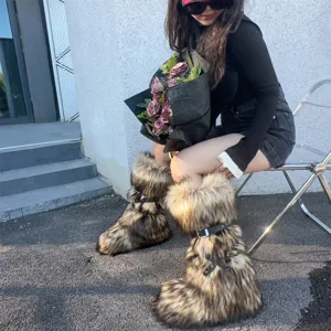 Stylish faux fur high-top platform snow boots worn by a model in a Y2K punk style setting