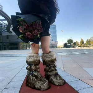 Detailed view of Y2K style faux fur snow boots featuring punk buckle straps and platform