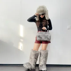 Grey Y2K style faux fox fur knee-high snow boots featuring warm thick fluffy lining