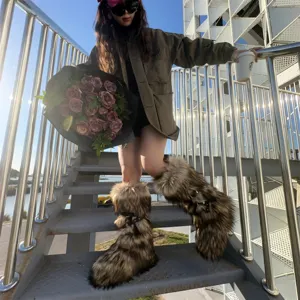 Chic Y2K punk style faux fur platform boots with buckle straps on a model