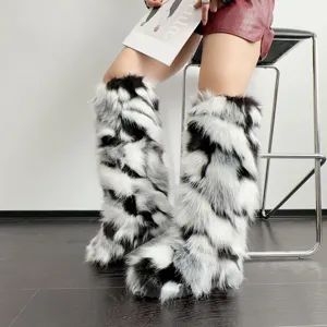 Y2K style high-top knee-high faux fur boots with black and white pattern detail view