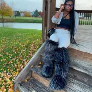 Y2K style fluffy faux fur knee high boots for winter, shown in an outdoor park setting