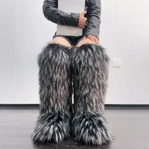 Detailed macro view of grey Y2K style faux fur knee-high snow boots for winter fashion