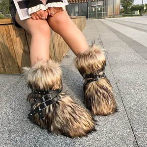 Detailed view of Y2K punk faux fur snow boots with studded buckle straps