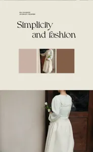 Elegante grembiule scamiciato in cotone bianco crema con dettagli a pieghe e incrocio