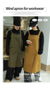 Due modelle indossano grembiuli da lavoro alla moda color oliva e senape in un corridoio