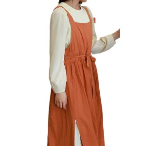 Modern minimalist burnt orange cotton strap apron with waist tie for kitchen anti-stain.