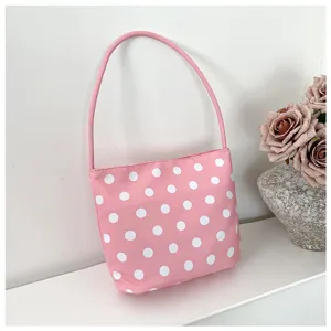 Bolso de hombro de nailon rosa con un diseño clásico de lunares blancos