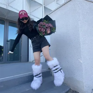 Y2K punk style white faux fur platform boots featuring rivet buckles and stylish straps.