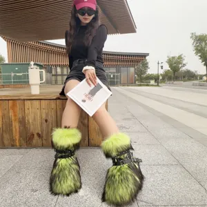 Detail shot of Y2K neon green faux fur platform boots with punk style buckle straps