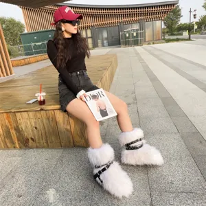 Close-up showing the fluffy white faux fur and buckle strap detail of Y2K punk boots