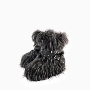 Y2K punk style faux fur snow boots with black studded straps on white background