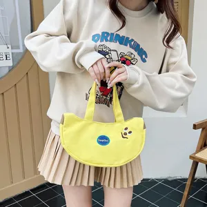 Süße Handtasche aus Segeltuch in Bananenform mit Cartoon-Stickerei