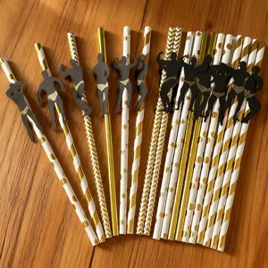 Disposable paper straws with muscle man cutout design for party decoration and events.