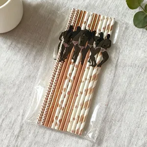 Disposable paper straws with muscular man silhouette design, perfect for bachelorette party.