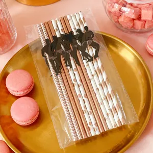 Disposable paper decorative drinking straws with funny muscular man cutout designs for parties.