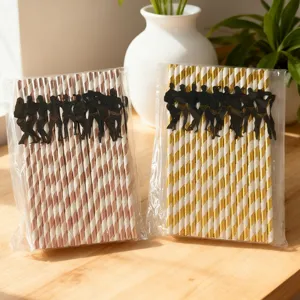 Disposable paper straws with muscular man silhouette, great for bachelorette party supplies.