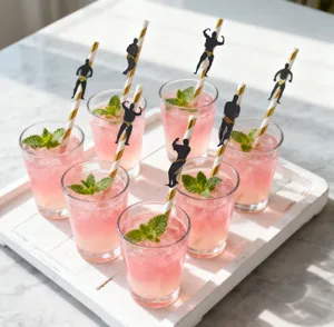 Disposable paper straws featuring creative muscle man party decoration for unique events.