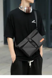Close-up detail of trendy mens casual crossbody messenger bag, versatile minimalist style.