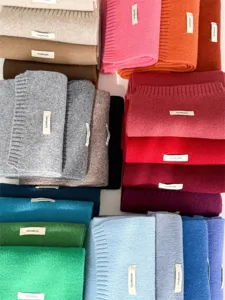 Cozy 100% wool scarf for women, warm winter neck warmer in multiple vibrant solid colors.