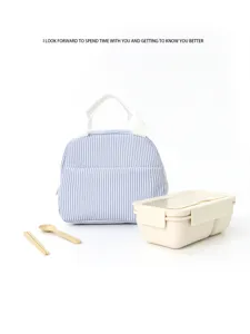 Blue and white striped lunch bag with bento box portable commuter tableware set for office.